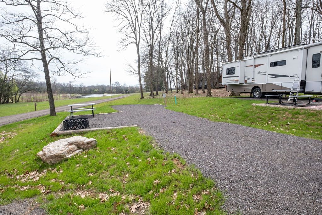 RV site with fire pit and picnic table