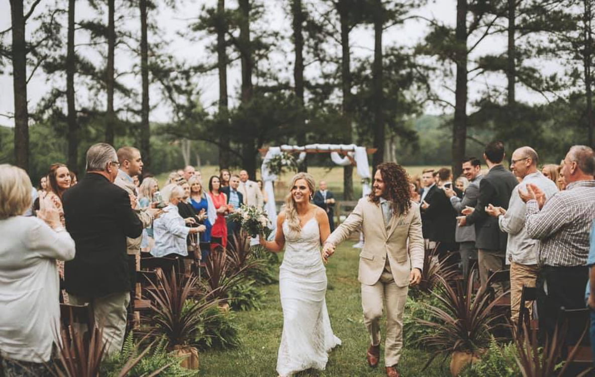 Outdoor wedding ceremony at Rural Hill Farm in Mt. Juliet during a relaxed wedding weekend celebration