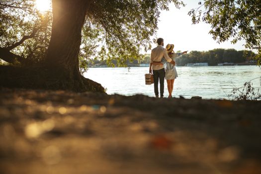Couple enjoying a lakeside getaway