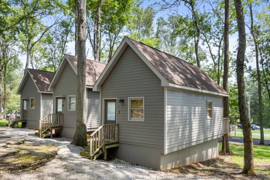 Cabins at Rural Hill Farm nestled in a wooded setting